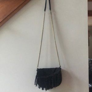 Suede fringed cross body bag